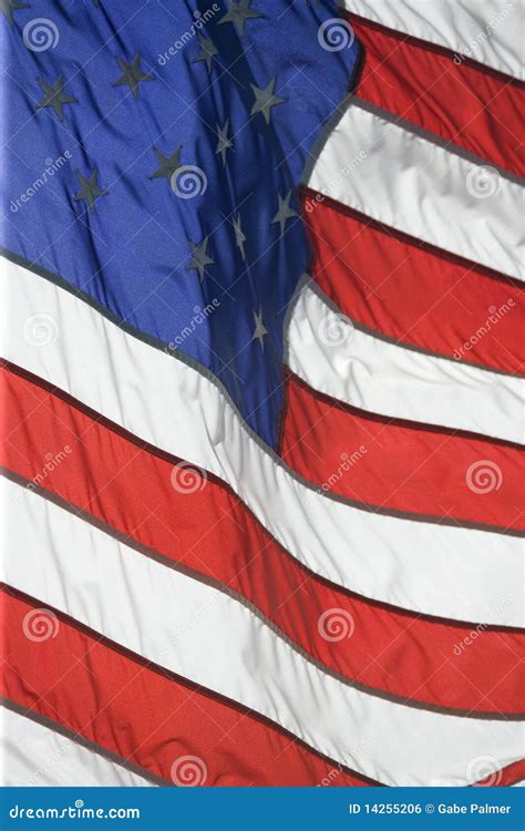 American Flag Flying Proudly on a Windy Day Stock Photo - Image of ...