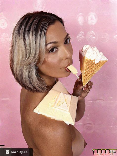 Sultry Brunette Folding Her Shirt