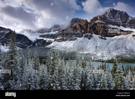 Mount Crowfoot & the Crowfoot Glacier above Bow Lake in the snow ...