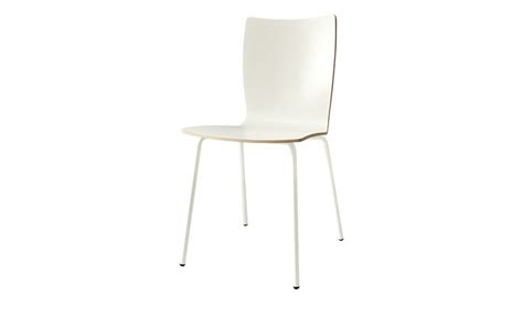 A White Chair Sitting On Top Of A Metal Frame