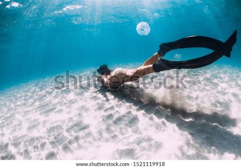 Naked Woman Freediver Glides Over Sandy Stock Photo