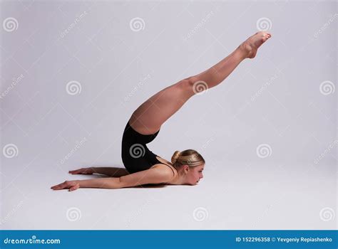 Beautifull Flexible Blonde Girl Posing Gymnastics Stock Photo Image Of Grey Cloth