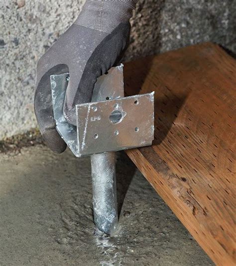 How To Install Post Base In Wet Concrete