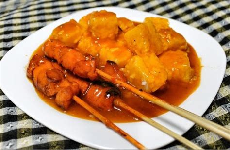 Satti is a meal of skewered beef or chicken served with steamed rice ...