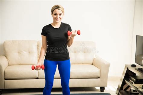 Cute Woman Lifting Weights at Home Stock Image - Image of hispanic ...