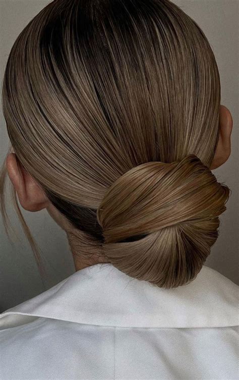 Gorgeous Wedding Hairstyles In Blonde Sleek Knot Low Bun