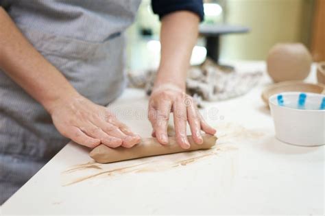 Hand Kneading Technique In Pottery Woman Wedging Clay With Hands