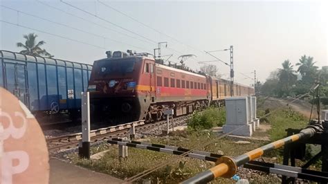 Two Trains Crossing At Rail Gate 22825 Shalimar MGR Chennai Central