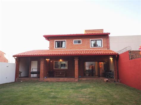 ELEGANTE Y AMPLIA RESIDENCIA PASOS DEL CIT Ref KA0E3B Infocasas Py