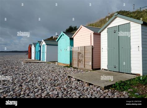 Beach Huts On A Stormy Day At Budleigh Salterton Devon UK Stock Photo