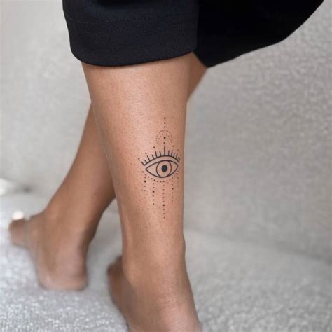 Evil Eye Tattoo Located On The Achilles