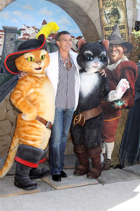 Antonio Banderas, Puss In Boots, and Kitty Softpaws at the Los Angeles Premiere of PUSS IN BOOTS ...