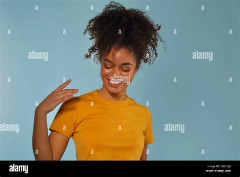 Beautiful Happy Dark Skinned African American Ethnicity Woman In Yellow