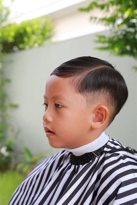 Asian Boy Cut in Haircut in the Garden, Fashion Haircut for a Guy Stock ...