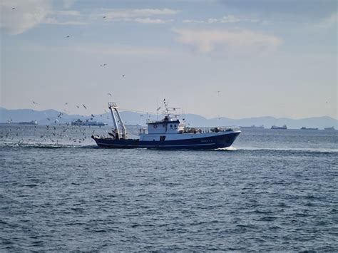 Fishing Boat on the Ocean · Free Stock Photo