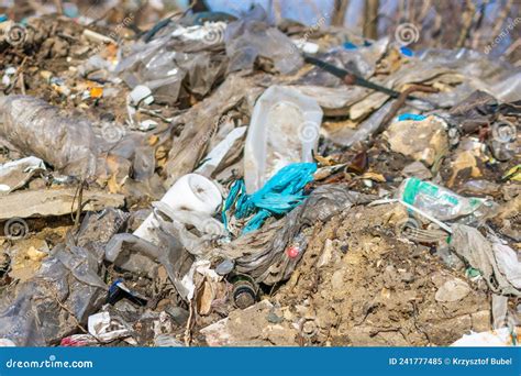 Wild Garbage Dump Residual Glass Plastics In The Forest Stock Image