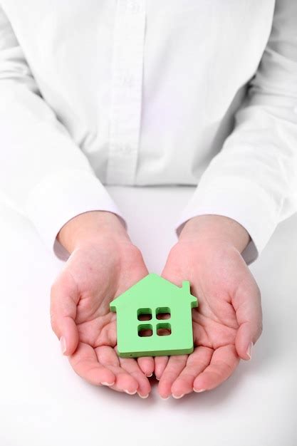 Premium Photo Female Hands Holding House Closeup