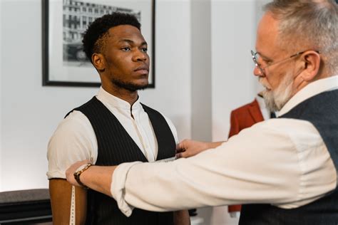 Man Wearing Black Suit in the Office · Free Stock Photo