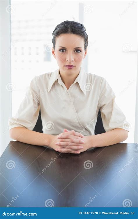 Stern Stylish Brunette Businesswoman Posing Looking At Camera Stock