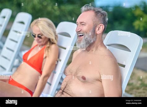 Mature Couple Sunbathing And Feeling Relaxed Stock Photo Alamy