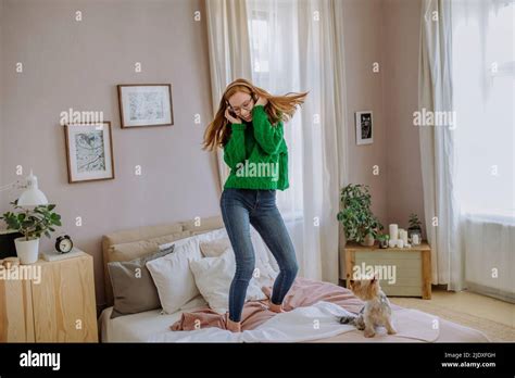 Happy Woman Listening Music Through Wireless Headphones Enjoying Dance