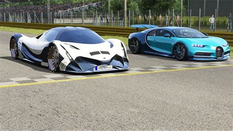 Two Bugatti Type Cars Driving On A Race Track With Spectators In The