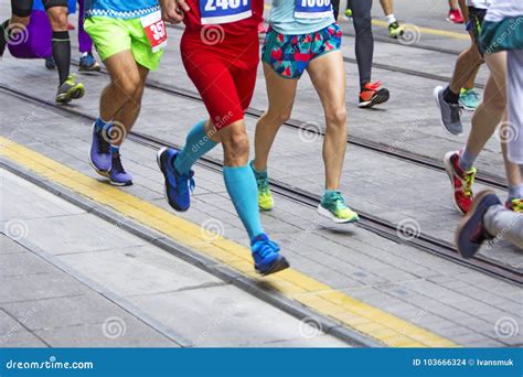 Marathon Runners Race in City Streets Editorial Stock Image - Image of ...