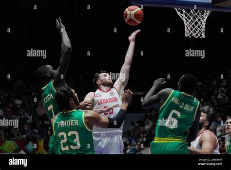 Lebanon S Wael Arakji Center Shoots Against Australia S Thon Maker