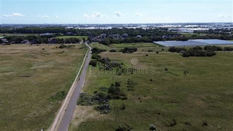 Top View Of The Beach Kijkduin And Sea Flight Over Fields With Green