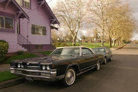 OLD PARKED CARS.: 1969 Mercury Marquis Convertible.