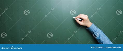 Hand of Teacher Holding Chalk in Front of Blank Blackboard Stock Photo ...