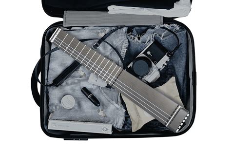 Suitcase Friendly Travel Guitar Built To Sound Like Acoustics Twice Its