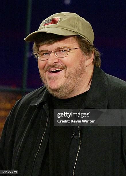 Michael Moore Appears On The Tonight Show Starring Jay Leno Photos And