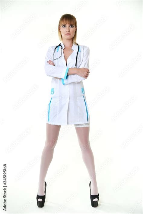 Sexy Woman Doctor With A Stethoscope Standing On White Background Sexy