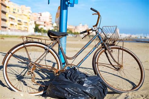 Premium Photo Bicycle Parked In Front Of Building