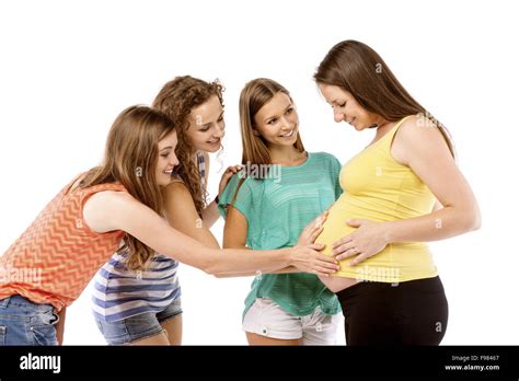 Female Friends Touching Tummy Pregnant High Resolution Stock