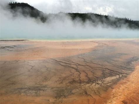 Stunning Landscape Of Hot Springs With Billowing Steam Emanating From The Body Of Water Stock