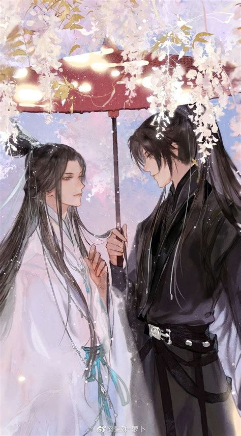 Two People Standing Under An Umbrella In The Rain