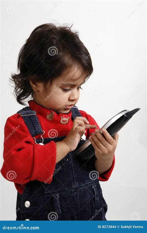 Kid playing with phone stock photo. Image of playing, dialing - 8272844