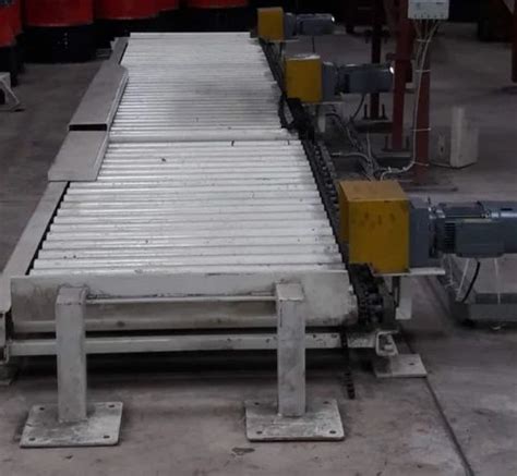 Stainless Steel 12 Feet L Roller Conveyor System Capacity 100 Kg