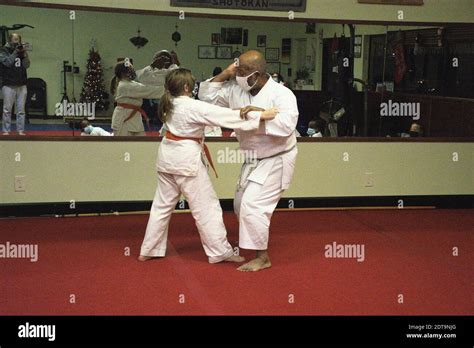 This action photo is of my daughter in her Karate class. Karate is a ...