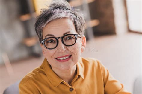 Photo Of Lovely Mature Lady Look Camera Toothy Smile Dressed Yellow Formalwear Modern Workplace