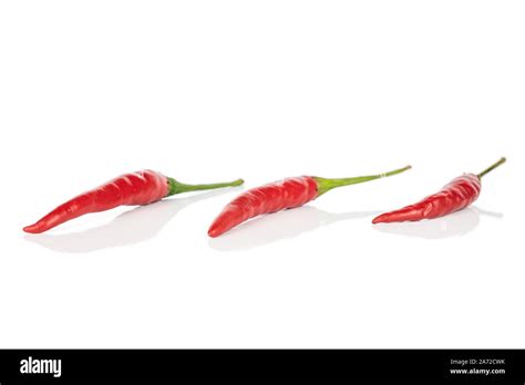 Group Of Three Whole Hot Red Chili In Line Isolated On White Background Stock Photo Alamy