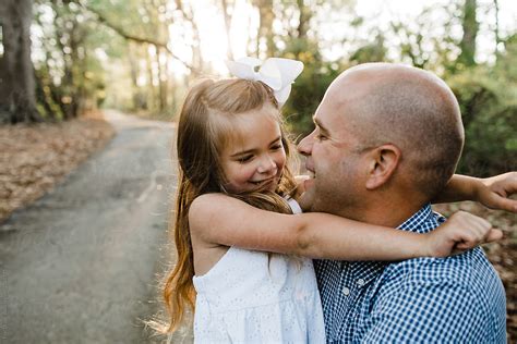 Sweet Father And Daughter Hugging By Stocksy Contributor Erin Drago