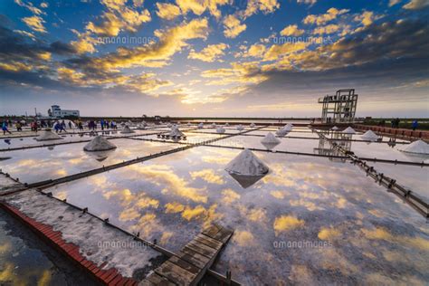 The Mirror Reflection Of Jingzaijiao Tile Paved Salt Fields Tainan