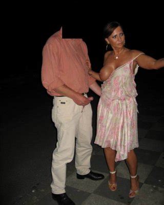 Busty German Lady Jerking Off Two Lucky Guys In Public Porn Pictures