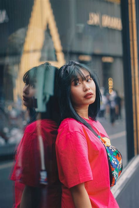 Woman In Red Long Sleeve Shirt Photo Free Streetwear Image On Unsplash