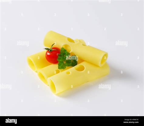 Swiss cheese slices Stock Photo - Alamy