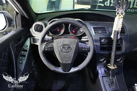 Mazda 3 – перетяжка руля в алькантару и аквапринт пластика