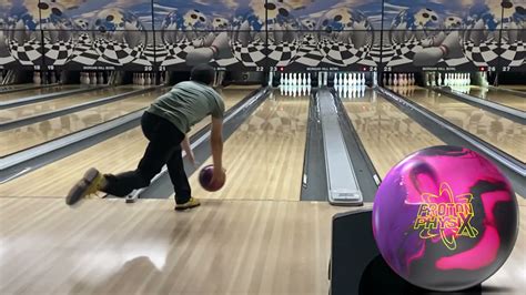 Two Handed Approach In Slow Mo With Several Different Bowling Balls